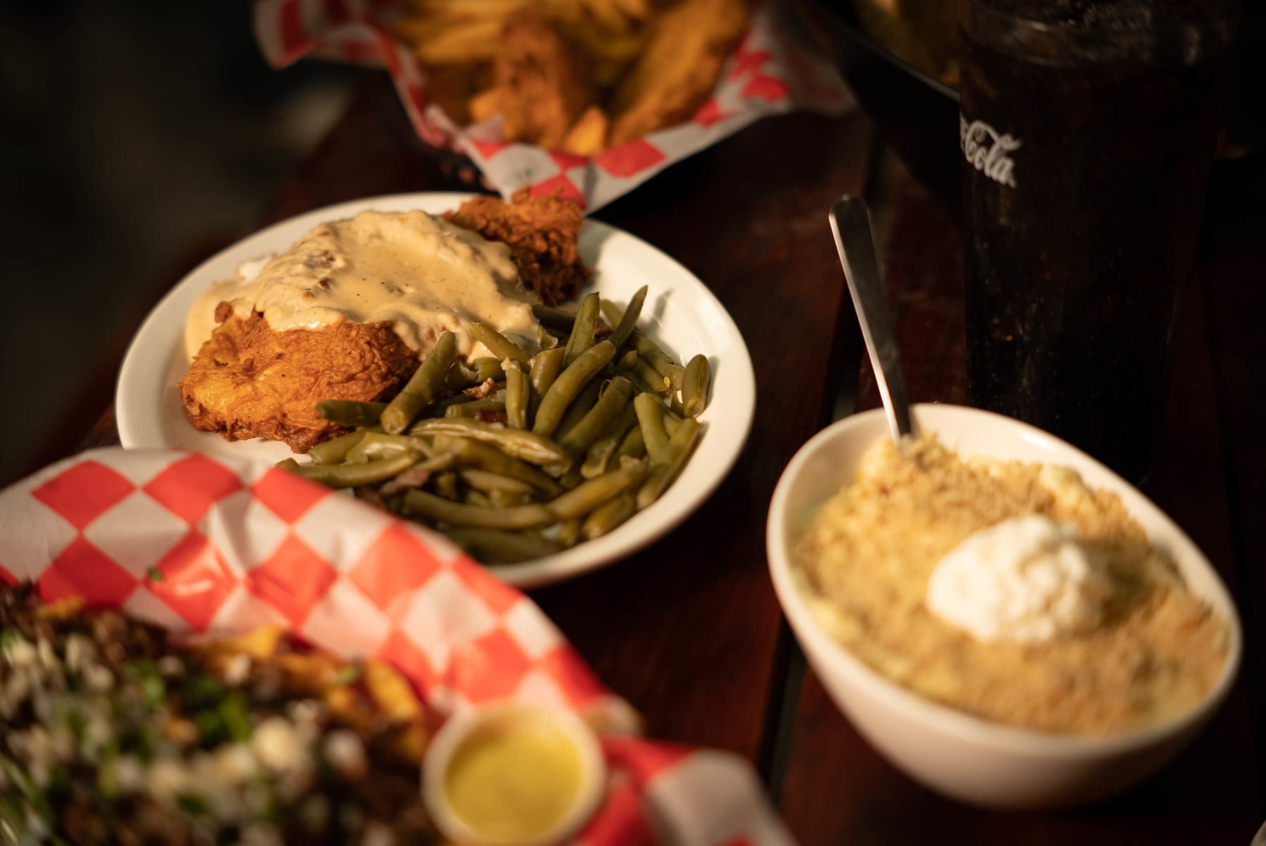 Chicken fried steak with green beans and sides